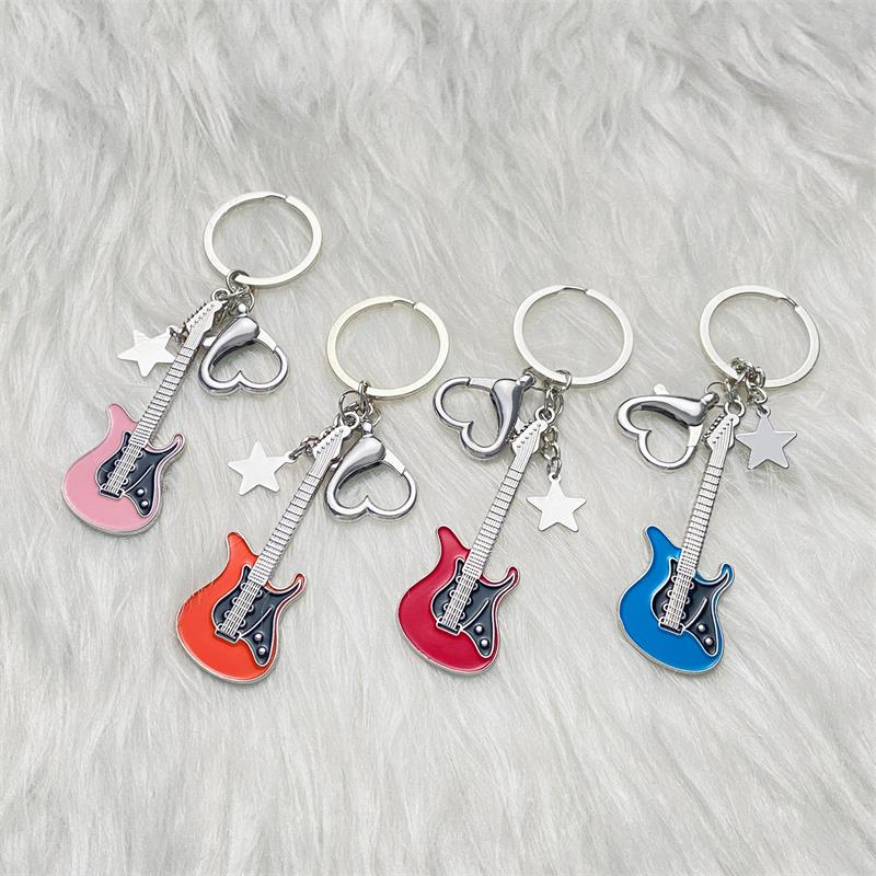 6PCS Creative Music Guitar Keychain Instrument Electronic Guitar Five-pointed Star Key Chain Pendant Hanging Backpack Accessory